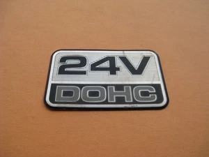 MERCURY FORD LINCOLN 24 V DOHC EMBLEM LOGO BADGE SIGN SYMBOL USED OEM A46216 - Picture 1 of 3