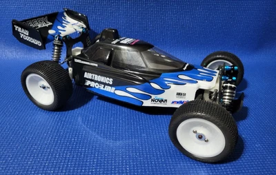 Yokomo Super Dog Fighter 870c NeoVintage Kinwald Replica 4WD  Buggy - ARTR - Image 1 of 4