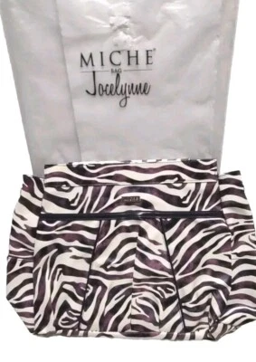 De colección Miche Prima Jocelynn Shell púrpura negro estampado de cebra imitación cuero Foto 1 de 4