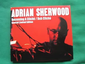 ADRIAN SHERWOOD - BECOMING A CLICHE / DUB CLICHE - LIMITED EDITION - 2 X CD - Foto 1 di 2
