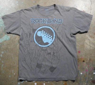 Camiseta promocional vintage Y2K banda de rock videogame grande desbotada Guitar Hero Metal EUA - Imagem 1 de 4