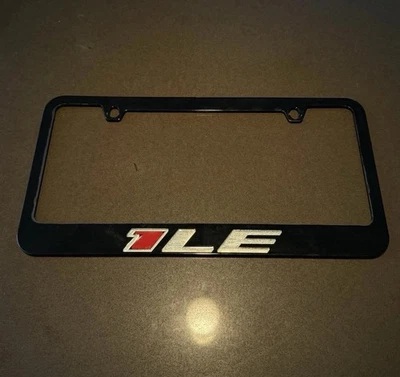 Chevrolet Camaro SS / ZL1 1LE Black Metal License Plate Frame - Red “1LE” Logo - Image 1 of 2