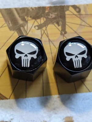 NUEVOS TAPONES DE VÁLVULA CALAVERA PUNUSHER NEGRO Y BLANCO PARA BICICLETAS CRUCERO, BMX Y COCHES Foto 1 de 4