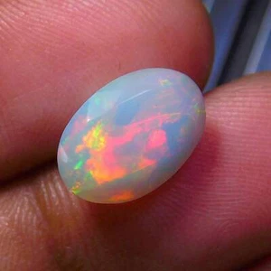 AAA White Base Ethiopian Opal Faceted Gemstone, Calibrated Size 12x8x5mm 2.35Cts - Picture 1 of 3
