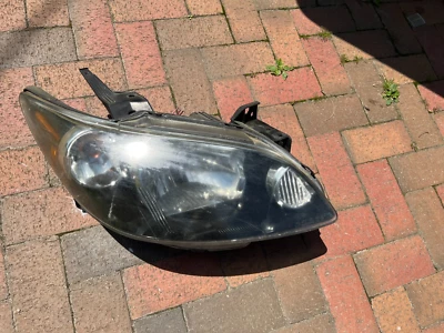 2004-2006年马自达MPV乘客右卤素车头灯总成 — 第 1/4 张图片