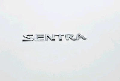 2007-2012 NISSAN SENTRA ЗАДНЕЙ КРЫШКИ ЭМБЛЕМА ЛОГОТИП ЗНАЧОК ЗНАК СИМВОЛ - Изображение 1 из 3
