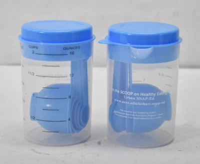 Lot of 2 16oz Measuring Cups w Plastic Measuring Spoons & Strainer/Pourer - Image 1 of 4