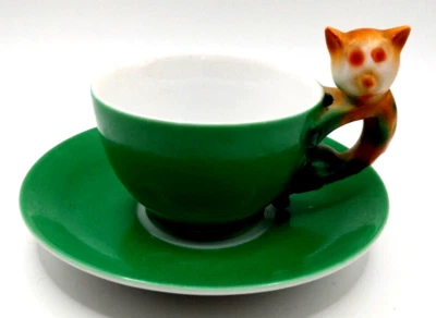 Taza y platillo Beyer and Bock con mango de gato, registrado, hecho en Alemania Foto 1 de 4