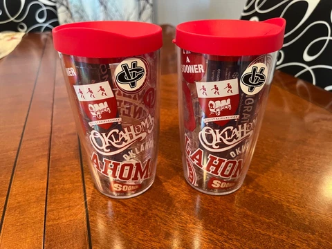 2 Oklahoma Sooners 16oz Tervis Tumblers. 1 Tumbler has a few scratches Cover