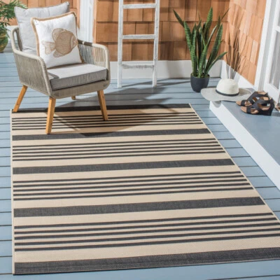 SAFAVIEH Indoor Outdoor CY6062-216 Courtyard Black / Bone Rug - Image 1 of 4