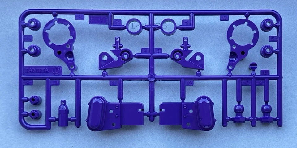 New Tamiya D Part Tree - Jun Watanabe Hornet - Purple Parts Body / Shock Mounts - Image 1 of 1