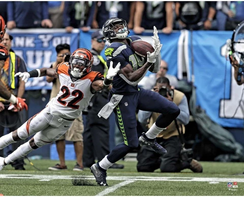DK Metcalf Seattle Seahawks Unsigned Reception Over Defender Photograph Cover