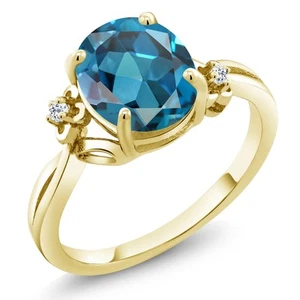 2.84 Ct Oval London Blue Topaz White Topaz 18K Yellow Gold Plated Silver Ring - Picture 1 of 4