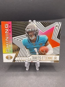 2021 Illusions Football Travis Etienne Jr Shining Stars Emerald Rookie SS-20 JAX - Picture 1 of 2