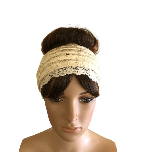 Diadema amarillo claro. Diadema de moda. Envoltura de cabeza de encaje elástico. Envoltura para el cabello. Foto 1 de 2