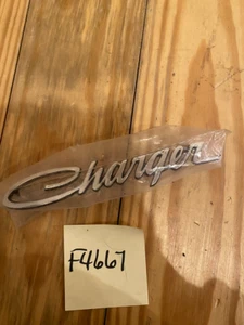 68 DODGE CHARGER GRILL HEADLAMP HEADLIGHT DOOR "CHARGER" EMBLEM - Picture 1 of 2