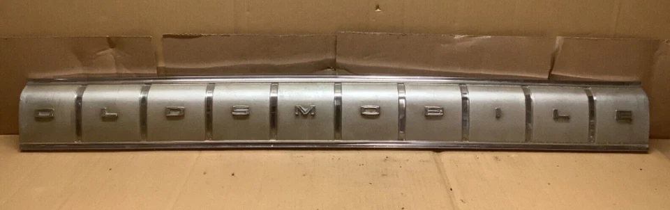 1964 Oldsmobile F-85 Rear Chrome Tail Center Panel & 5 Nuts Restoration - Image 1 of 4