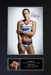 #266 JESSICA ENNIS Riproduzione Firma/Autografia Montata Fotografia Firmata A4 - Foto 1 di 2
