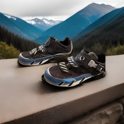 Zapatos de ciclismo Pearl Izumi para hombre talla 8,0 EU 41 negros con detalles azules, modelo 5030 Foto 1 de 4