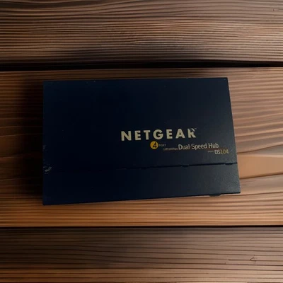 Netgear DS104 4-Port 10/100 Dual Speed Hub No Cord - Image 1 of 4