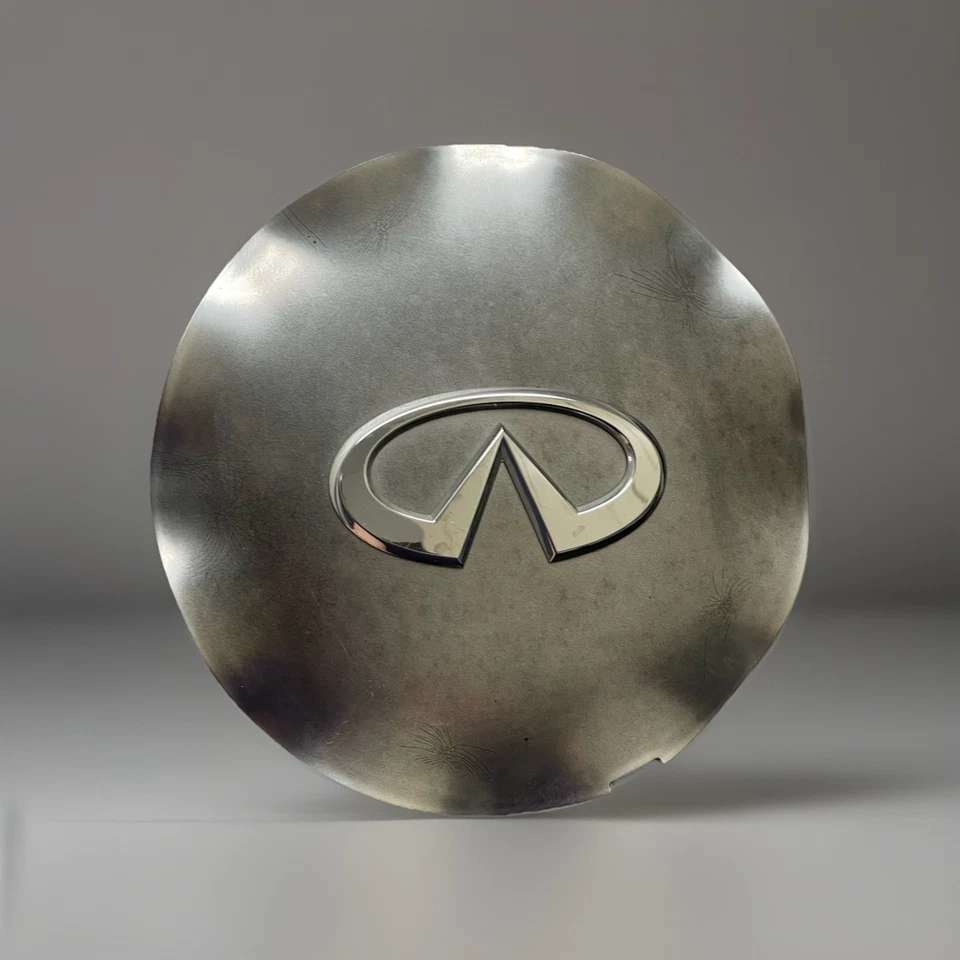 03 04 05 Tapa central de rueda Infiniti FX35 FX45 e Infiniti Q45 2005 40315-CG010 OEM Foto 1 de 4