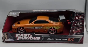 Fast & Furious Brian’s 1995 Toyota Supra Turbo Boost RC auto (nuova | nuova con scatola) - Foto 1 di 6