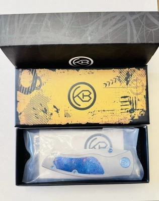 Cuchillos Kubey KB Vertigo Framelock Titanio y Timasco Plegable S35VN Cuchillo 258D Foto 1 de 4