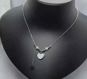 "Heart-Shaped Titanium Steel Pendant Necklace with Mother of Pearl - Unique Gift - Picture 1 of 7