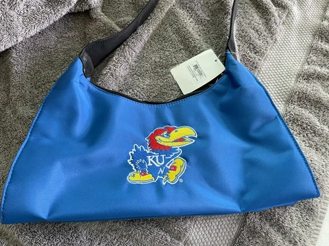 KU Kansas University Purse, New with Tags. Made of Nylon Cover