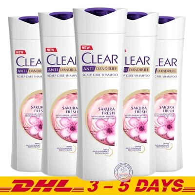 145 ml x 5: Champú anticaspa Sakura fresco transparente con extracto de flor Sakura Foto 1 de 4