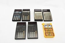 Lot of 7 Vintage Texas Instruments Calculators (22-563)