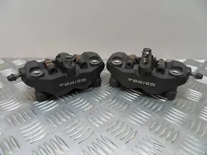 Pinzas de freno delanteras radiales genuinas Suzuki GSXR 600 750 1000 TOKICO 2005 a 2008 - Imagen 1 de 12