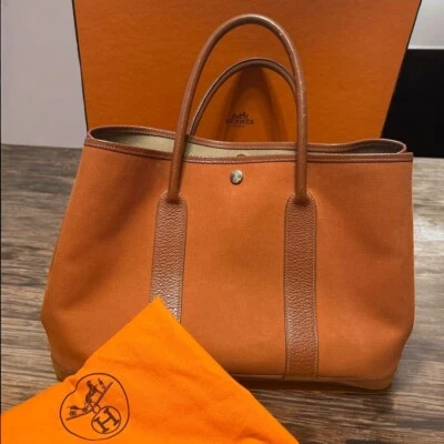 Bolso de Mano HERMES Jardín Fiesta PM Lona Cuero Potiron Naranja con Caja Bolsa de Almacenamiento Foto 1 de 4