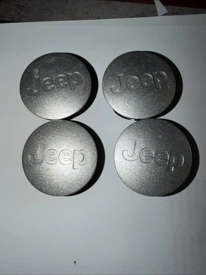 Tapas centrales plateadas originales Jeep Cherokee Compass JK JKU Wrangler MÁS (4) Foto 1 de 2