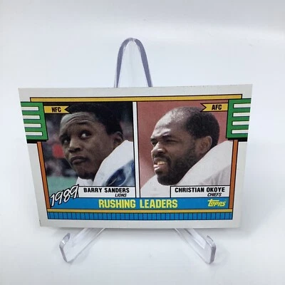 1990 Topps #28 Barry Sanders / Christian Okoye Rushing Leaders - Image 1 of 4