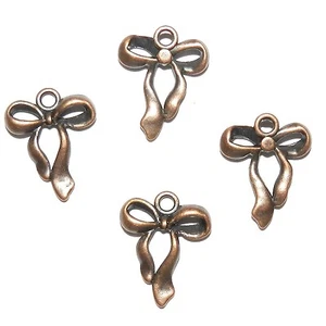 MBL3118 Antiqued Copper 23mm Double-Sided Bow Metal Charm Drop Beads 25pc - Picture 1 of 3