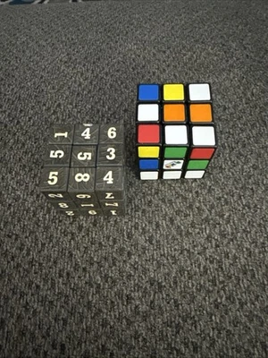 Lote de 2- Cubo y Cubo de Rubik Puzzle Edición "Sudoku". Juego lógico usado en excelente estado Foto 1 de 3