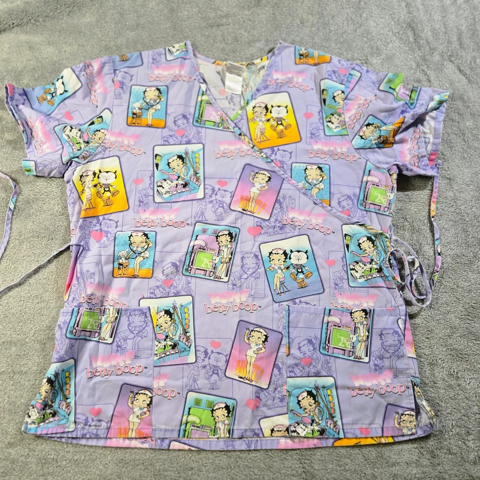 Blusa Médica Betty Boop Para Mujer Grande Manga Corta con Corbatas De Colección Enfermera Lavanda Foto 1 de 4