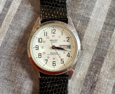 Reloj de cuarzo vintage Sharp para hombre 257761 Railroad 24 horas plata expansión 34 mm Foto 1 de 4