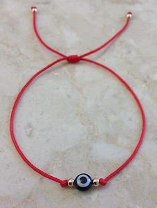 Pulsera Cabalá Cuerda Roja Ojo Negro Cuentas Tono Dorado Buena Suerte Dije Protección - Imagen 1 de 3