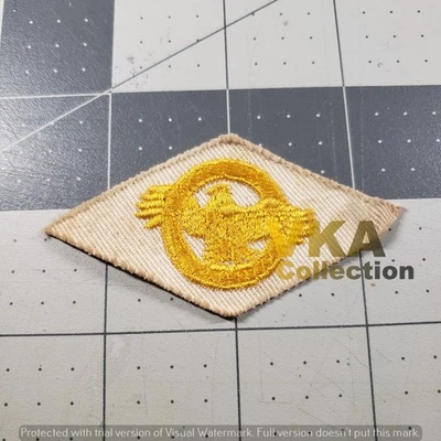 White Twill Ruptured Duck Honorable Discharge Patch - Image 1 of 2