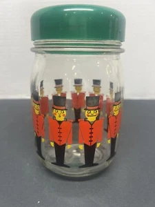 Vintage Weihnachten Nussknacker Soldat Glasdose mit rotem Kunststoffdeckel - Bild 1 von 5