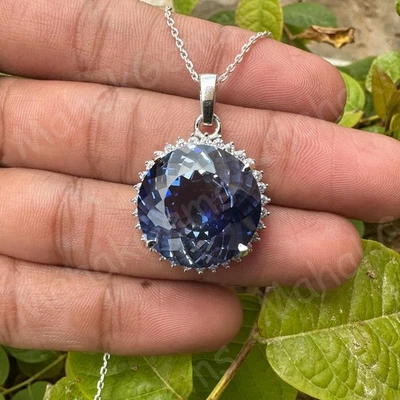 Colgante con halo de zafiro azul natural de 55 quilates - Piedra preciosa certificada en plata 925 Foto 1 de 4