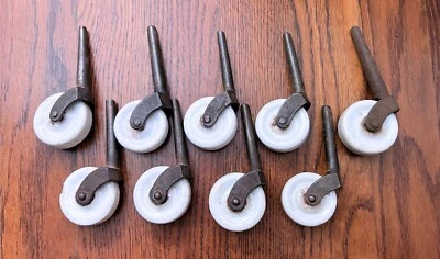 LOTE DE 9 RODILLOS MUEBLES ANTIGUOS GRANDES DE PORCELANA BLANCA Y HIERRO DE 1-5/8" Foto 1 de 4