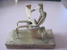 Unusual Art Metal Sitting On A Toilet Reading A Newspaper Free Shipping