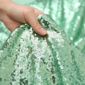 Tessuto paillettes verde menta materiale lucido scintillante 130 cm larghezza 1 metro - Foto 1 di 5