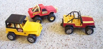 LOT  Nylint Jeep Roll Cage &  Nylint Sand/Gravel Jeep & Buddy L Monster Truck - Image 1 of 3
