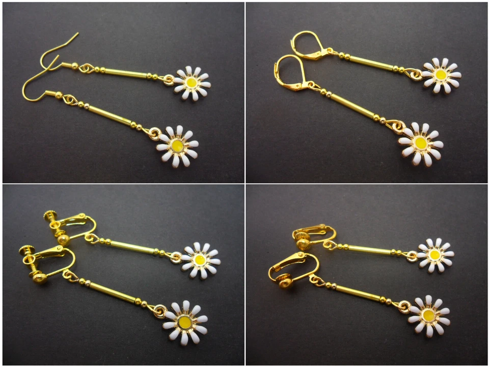 UN PAR DE PENDIENTES DE FLORES DE MARGARITA PERFORADOS O ENCHAPADOS EN ORO. Foto 1 de 1