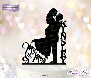 Silhouette Acrylic Wedding Cake Topper ~ Groom holding Bride, w/Name [TLA41] - Picture 1 of 4