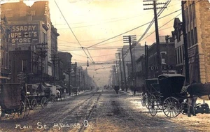 Alliance OH Street View Horse & Wagons Storefronts Trolley Tracks RPPC Postcard - Picture 1 of 2